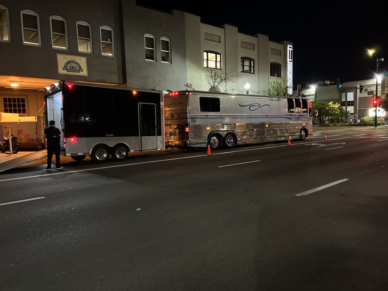AST coach and trailer loading in at night