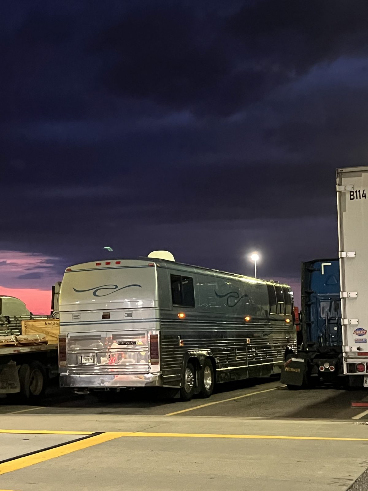 AST coach at dusk