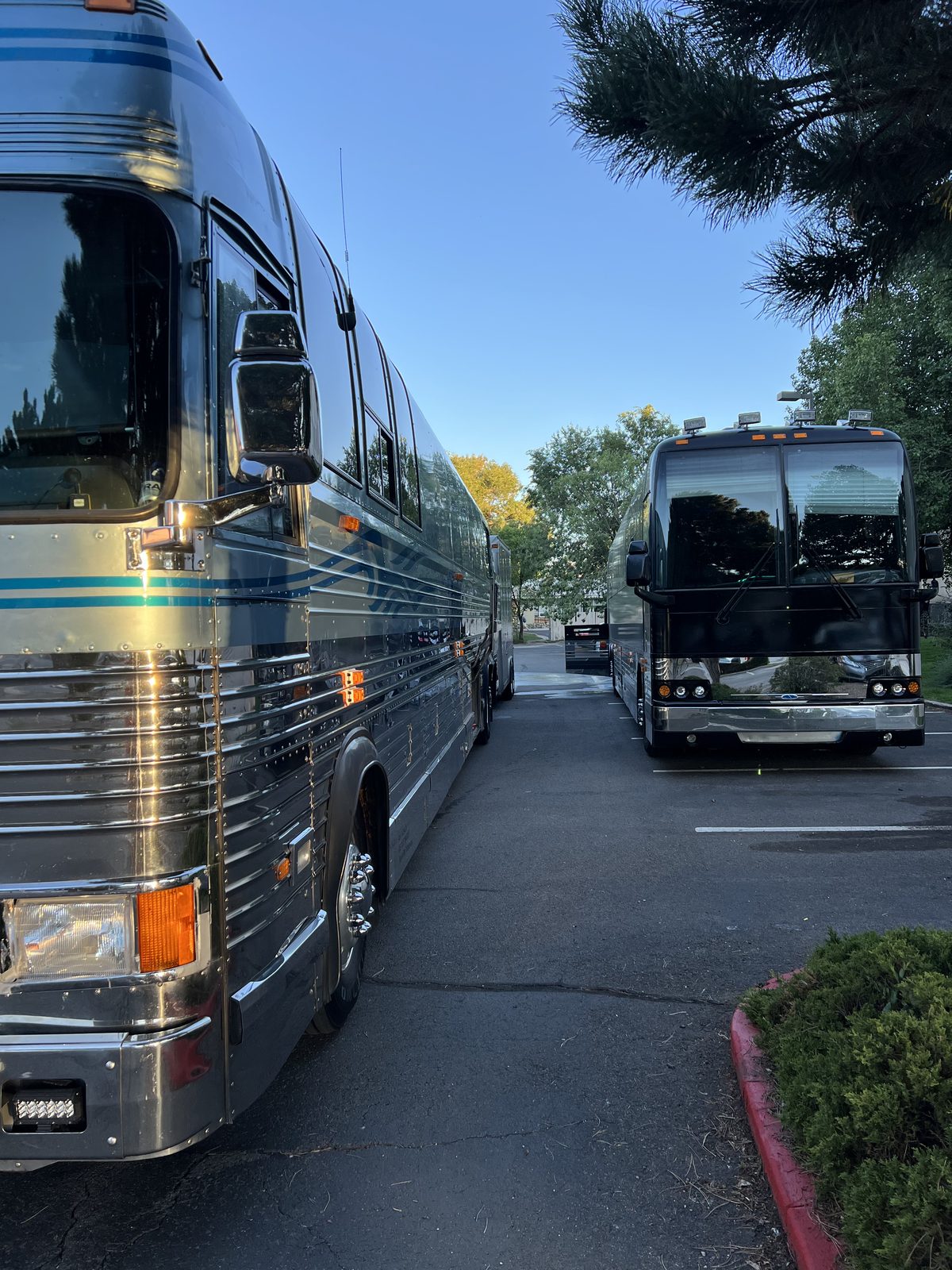 AST coaches at sunset
